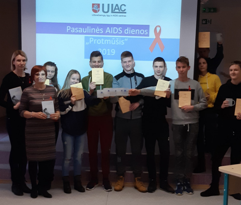 Raudonas kaspinas – AIDS simbolis